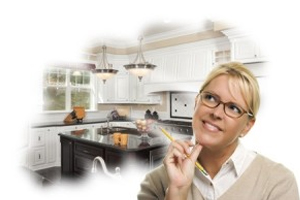 Woman picturing dream kitchen in her head